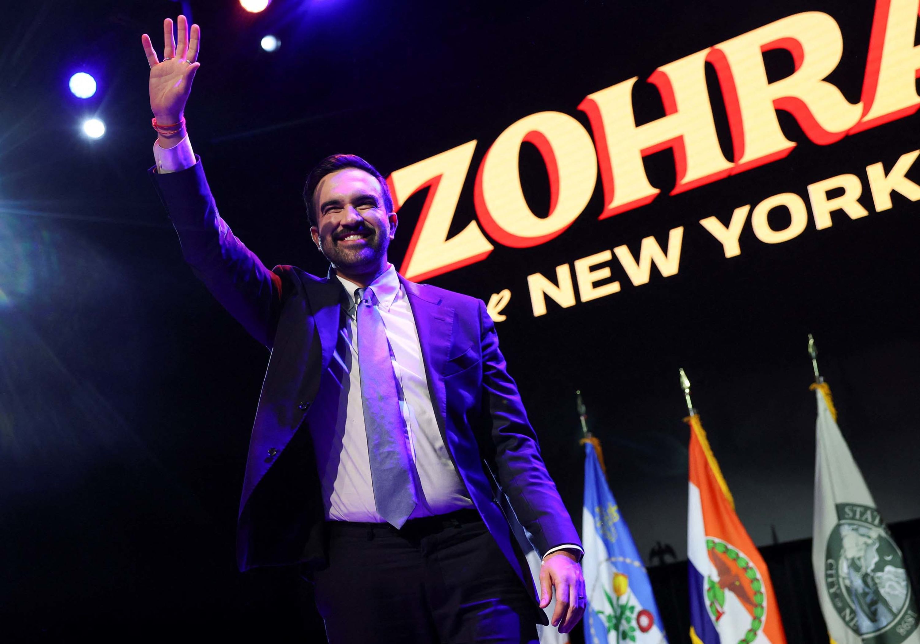 New York Mayor-elect Zohran Mamdani waves to supporters on stage at his election-night rally in Brooklyn on Tuesday, November 4.