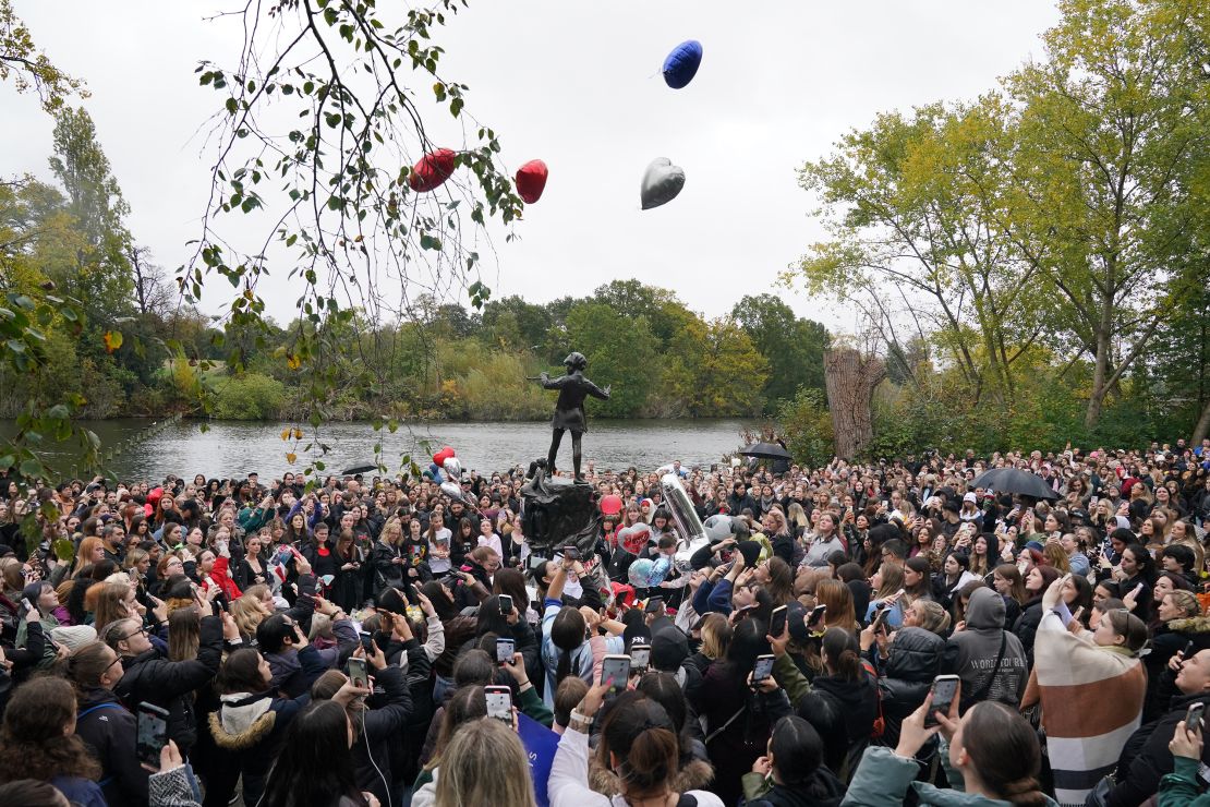 People releasing balloons during a vigil for former One Direction singer Liam Payne at London's Hyde Park during a memorial for the singer on Sunday. Jonathan Brady/PA Wire