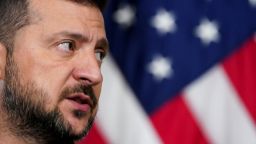 FILE PHOTO: Ukraine's President Volodymyr Zelenskiy looks on as he meets with democratic presidential nominee and U.S. Vice President Kamala Harris (not pictured), in the Vice President's Ceremonial Office in the Eisenhower Executive Office Building on the White House campus in Washington, U.S., September 26, 2024. REUTERS/Kevin Lamarque/File Photo