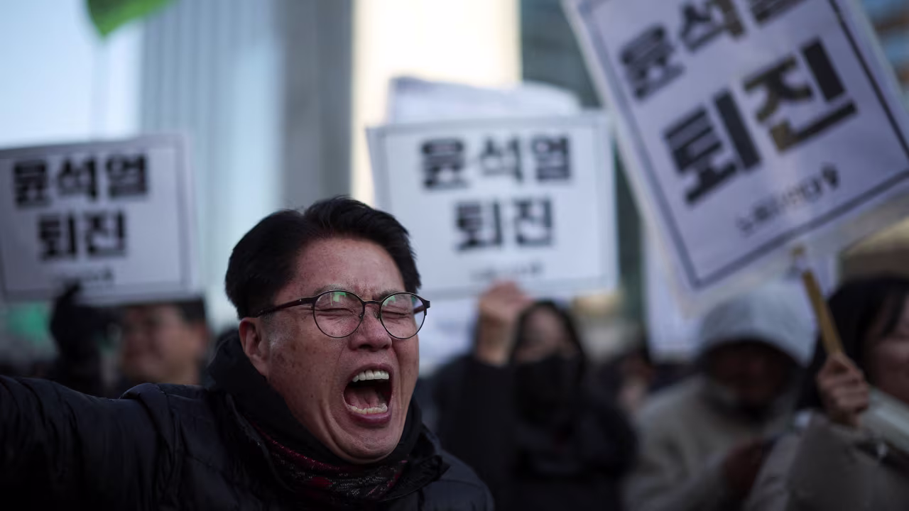 A man chants slogans during a rally calling for the expulsion of President Yoon Suk Yeol in Seoul on December 4.