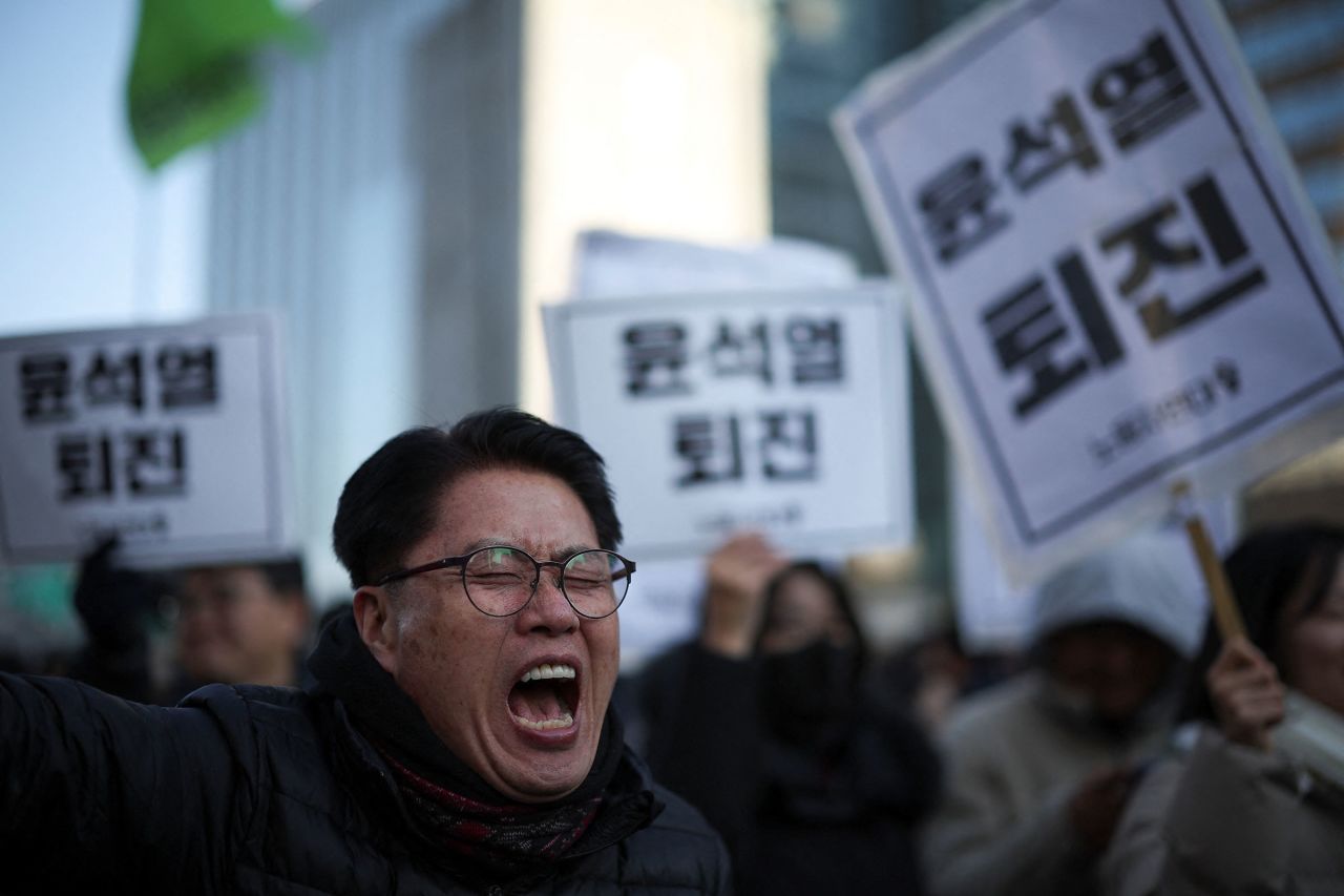 A man chants slogans during a rally calling for the expulsion of President Yoon Suk Yeol in Seoul on December 4.