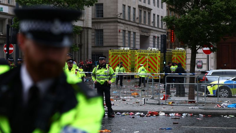 Man arrested after car plows into pedestrians during Liverpool Football Club’s victory parade | CNN