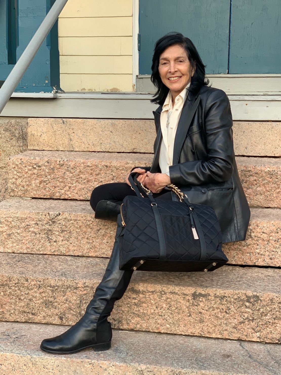 Francine Farkas Sears, president and founder of Francine Collections and Women in Business, on the steps of her design office in 2025.