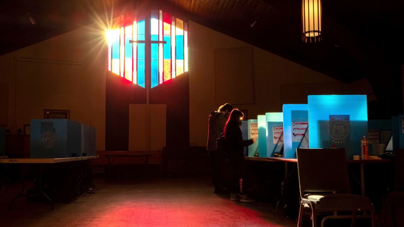 Voters mark their ballots at the Lawrenceville Road United Methodist Church in Tucker, Georgia, in January 2021.