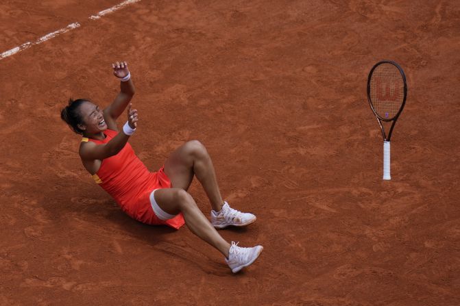 China's Zheng Qinwen celebrates after <a >defeating Poland's Iga ?wi?tek</a>, the world’s top-ranked tennis player and a dominant force on clay, in the Olympic semifinals on August 1. Qinwen, the No. 6 seed, won in straight sets: 6-2, 7-5.