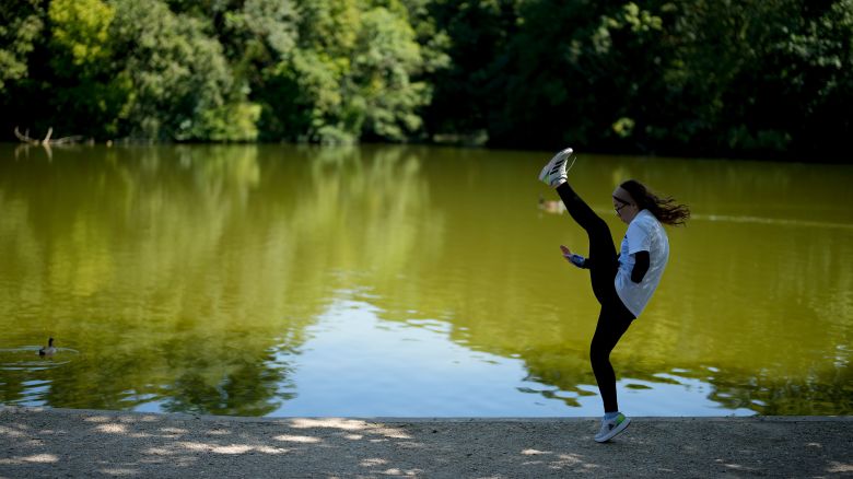 Afghan Taekwondo Paralympian Zakia Khudadadi, part of the Refugee Olympic Team, demonstrates her training routine after an interview with The Associated Press at the 2024 Summer Olympics, Monday, Aug. 5, 2024, in Paris, France. (AP Photo/Natacha Pisarenko)