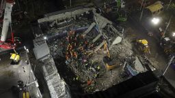 Rescue workers search for bodies at the Jet Set nightclub after its roof collapsed during a merengue concert in Santo Domingo, Dominican Republic, Thursday, April 10, 2025. (AP Photo/Matias Delacroix)