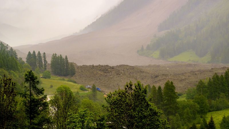 Mud and rock buries evacuated Swiss village after glacier collapse, one person missing