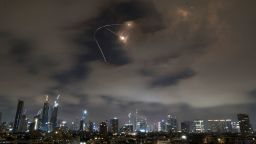 Israeli air defense system fires to intercept missiles during an Iranian attack over Tel Aviv, Israel, Saturday, June 21, 2025. (AP Photo/Leo Correa)
