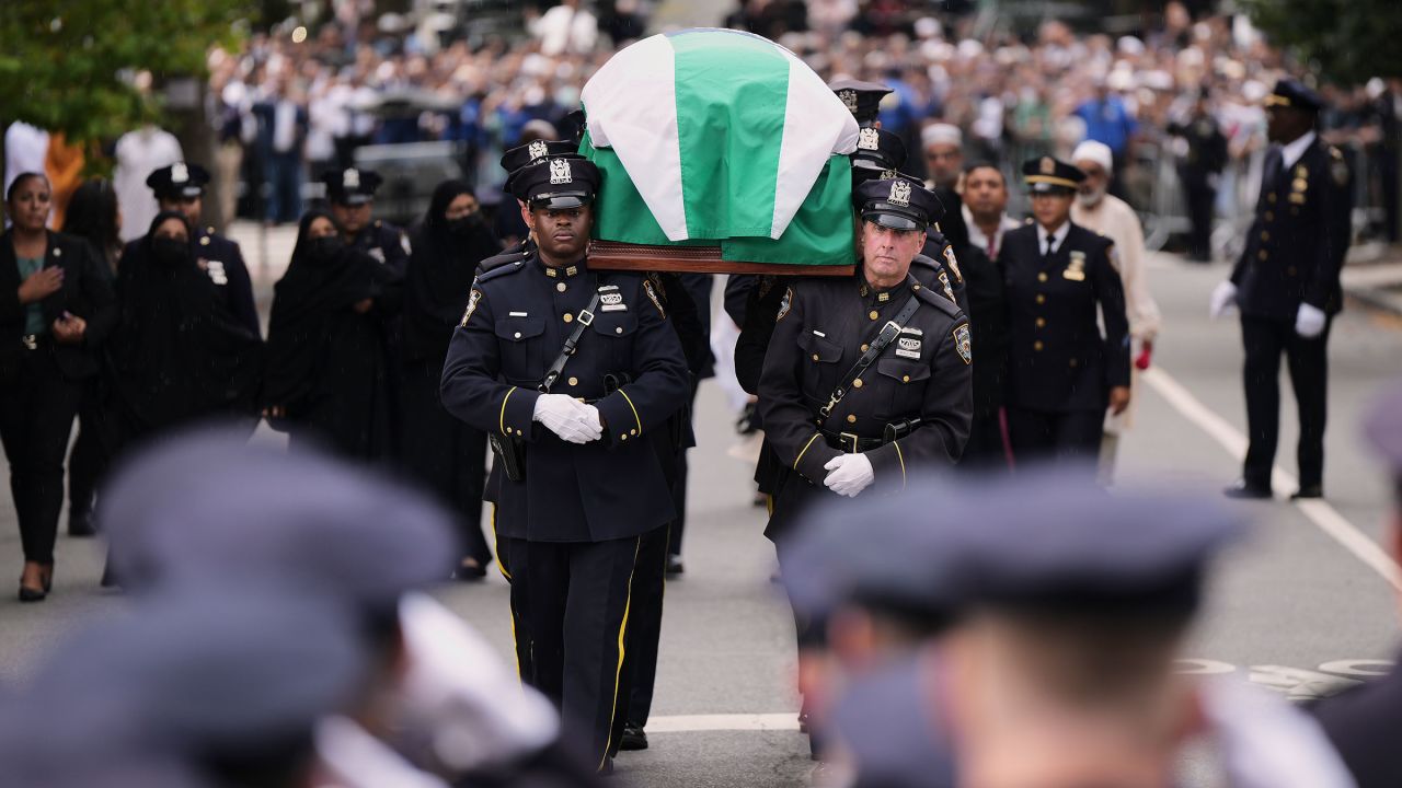 Pallbearers with the NYPD Ceremonial Unit carry the casket of officer Didarul Islam during his funeral in New York on July 31, 2025.