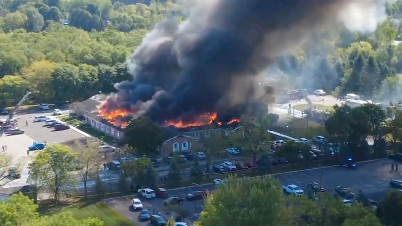 In this image taken from video released by Julie J, @Malkowski6April, Massive flames and smoke rise from The Church of Jesus Christ of Latter-day Saints in Grand Blanc, about 50 miles north of Detroit, Sunday, Sept. 28, 2025. (Julie J, @Malkowski6April via AP)