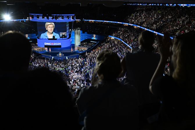 People inside the United Center watch US Sen. Elizabeth Warren speak on Thursday.