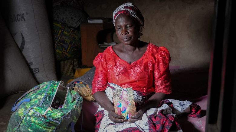 Yana Galan, mother of kidnapped Chibok Girl, seated and holding a picture of her daughter Rifkat

Yana Galang holds a picture of her daughter Rifkat, one of the 276 schoolgirls who were kidnapped by Book Hiram in April 2014. 