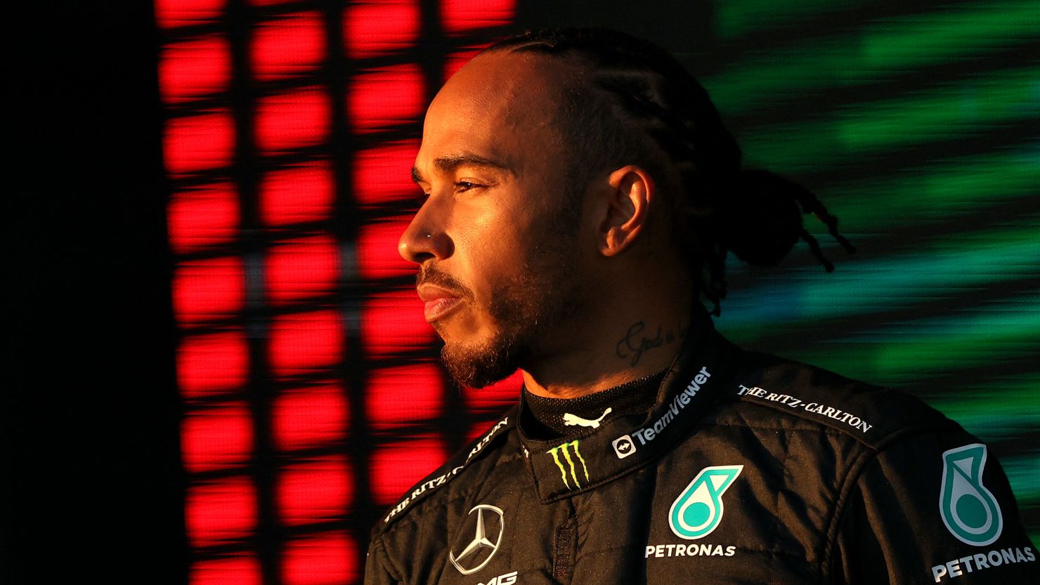 Mercedes' British driver Lewis Hamilton stands on the podium after the 2023 Formula One Australian Grand Prix at the Albert Park Circuit in Melbourne on April 2, 2023.