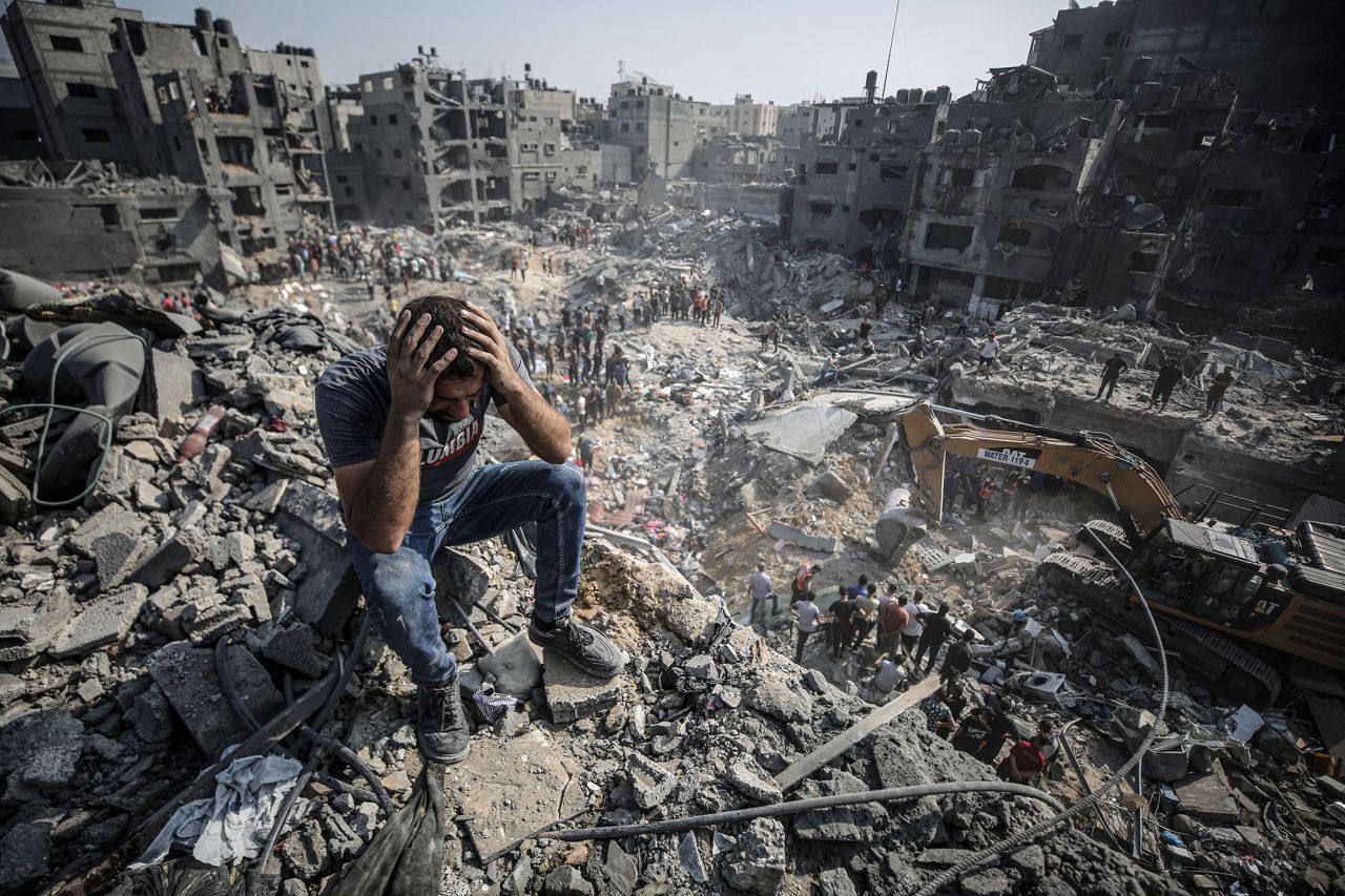 Palestinians conduct a search and rescue operation after bombardment by the Israeli army at Jabalia refugee camp in Gaza on November 1.