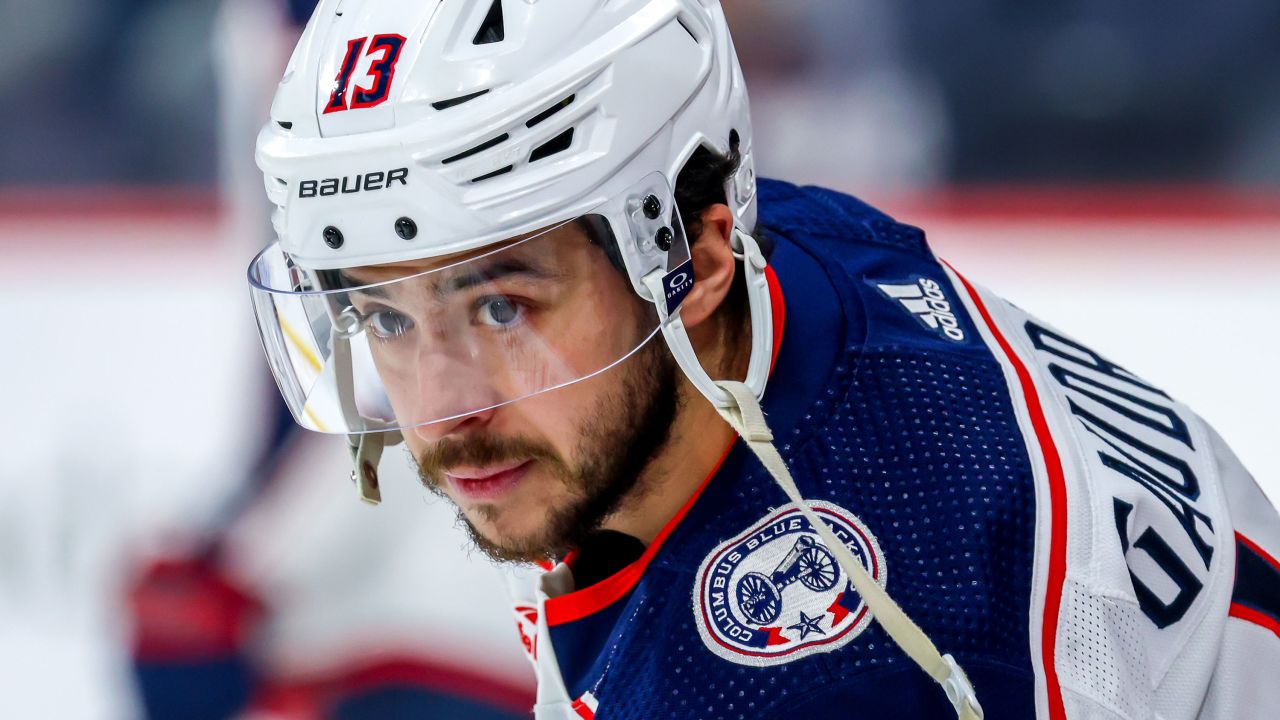 WINNIPEG, CANADA - JANUARY 09: Johnny Gaudreau #13 of the Columbus Blue Jackets looks on during the pre-game warm up prior to NHL action against the Winnipeg Jets at Canada Life Centre on January 09, 2024 in Winnipeg, Manitoba, Canada. (Photo by Jonathan Kozub/NHLI via Getty Images)