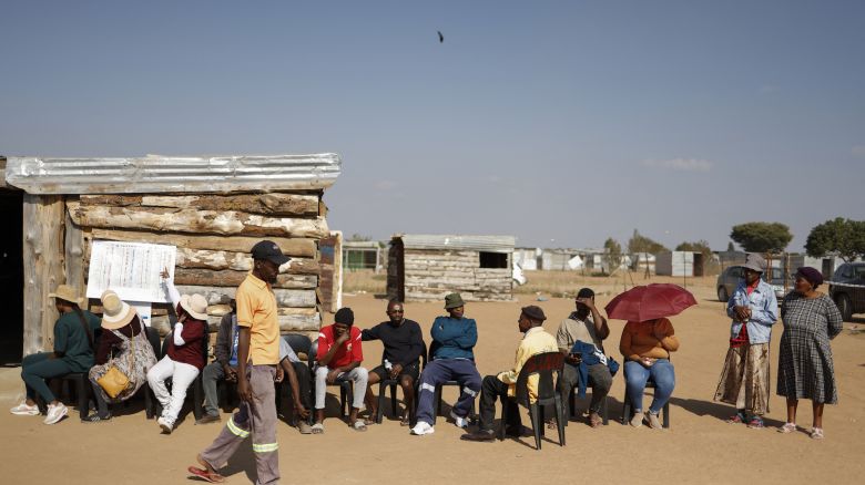 Voters queue outside a polling station in Juju Valley, Polokwane, on May 29, 2024, during South Africa's general election.