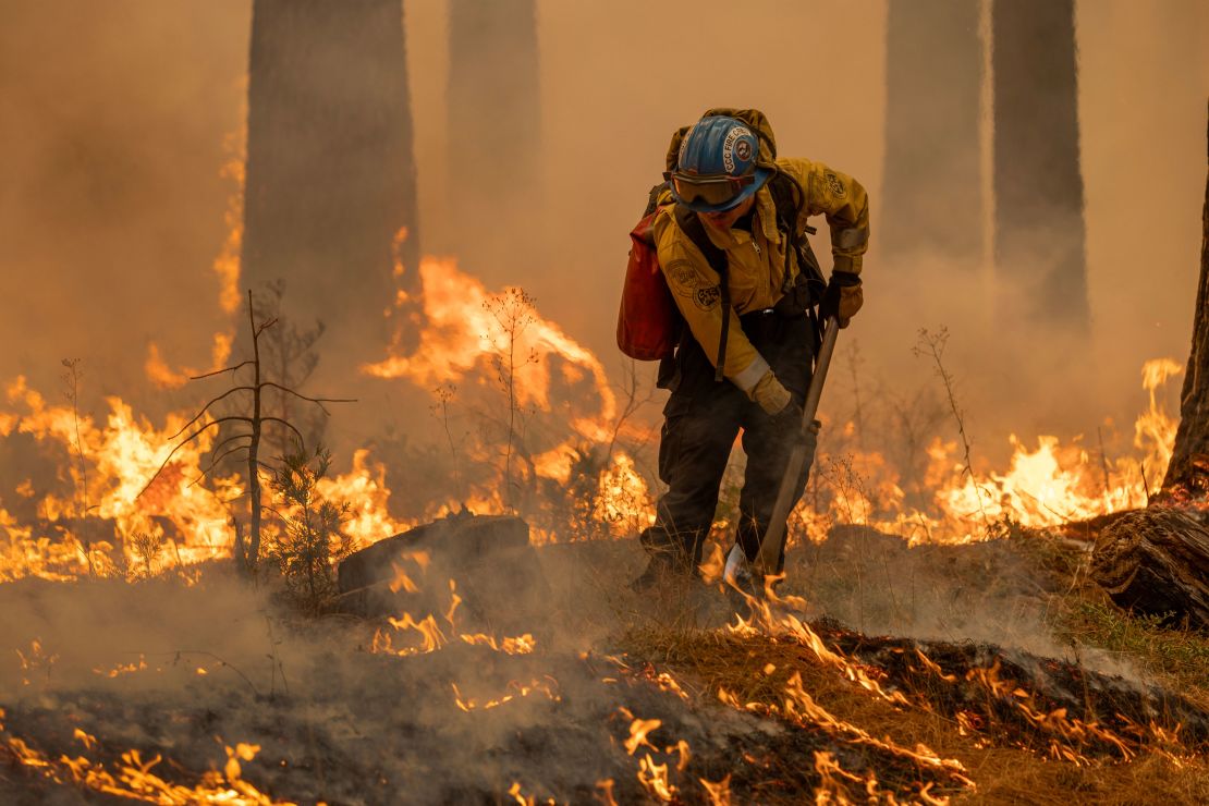 Firefighters set a backfire on the eastern front of the Park Fire on Sunday. Fueled by dry winds and dried vegetation, the blaze has grown to more than 360,000 acres and was 12% contained.