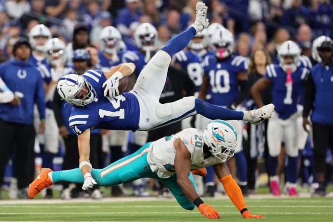 Indianapolis Colts wide receiver Alec Pierce is tackled by Miami Dolphins linebacker Jordyn Brooks on Sunday, October 20, in Indianapolis. The Colts won 16-10.