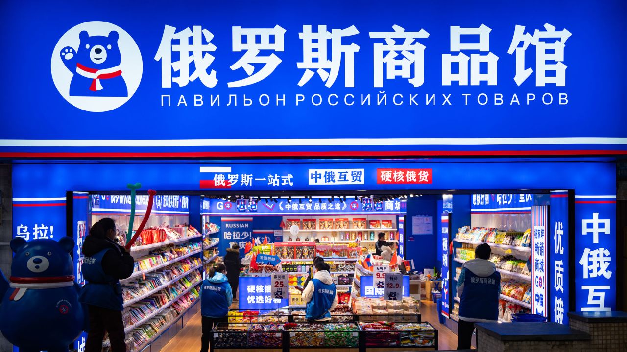 Workers wait for customers at a shop selling Russia products in southwest China's Chongqing municipality, on January 4, 2025. The fast expansion of shops selling Russian goods across China has sparked concerns over the authenticity of the products.
