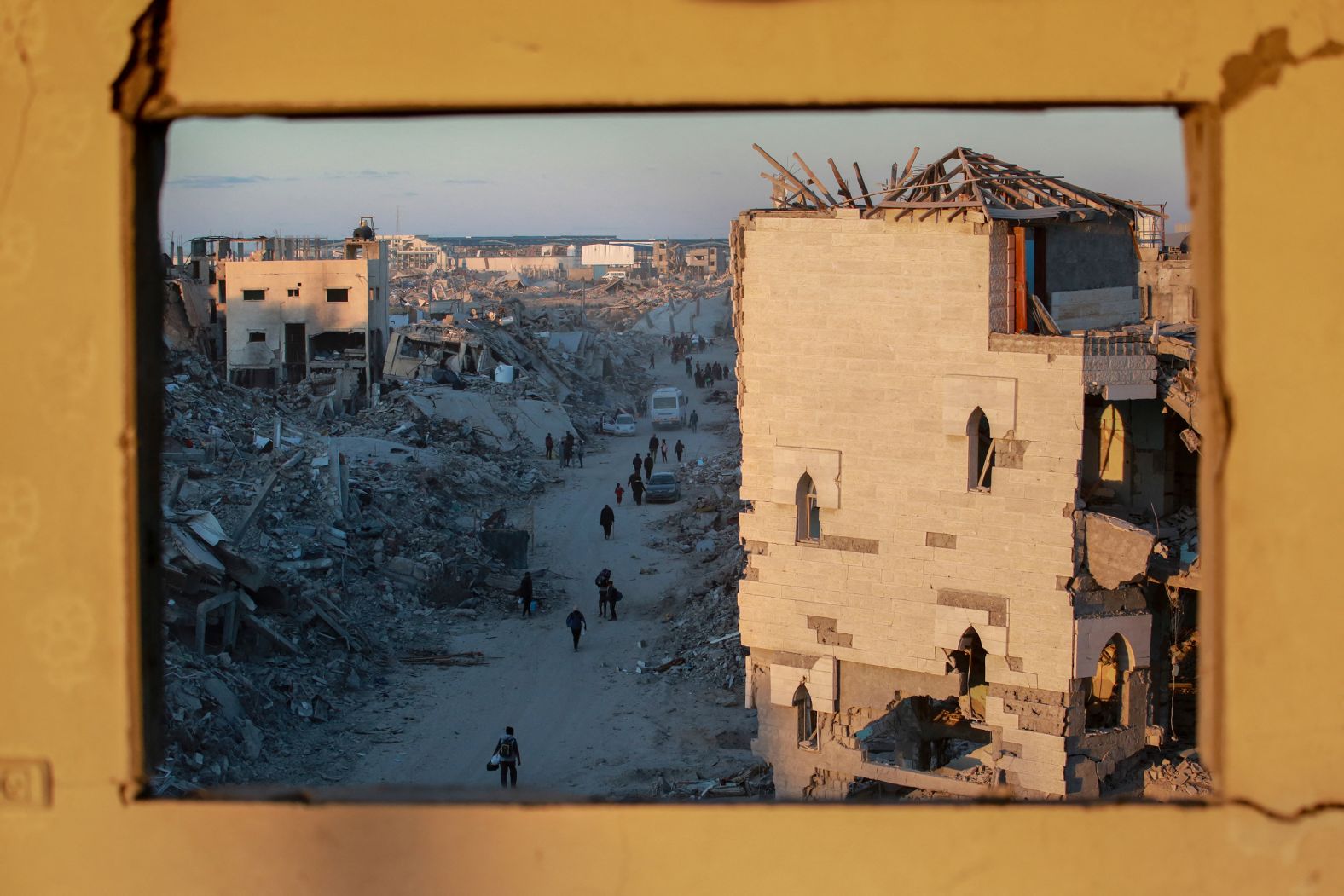 Residents return to a destroyed neighborhood in Rafah, Gaza, on Monday, January 20, a day after a <a href="index.php?page=&url=https%3A%2F%2Fwww.cnn.com%2F2025%2F01%2F14%2Fmiddleeast%2Fisrael-hamas-gaza-ceasefire-hostage-deal-explainer-intl%2Findex.html">ceasefire deal went into effect</a> between Hamas and Israel. The deal represents the second ceasefire since the war started on October 7, 2023, when Hamas militants launched an attack into Israel, killing more than 1,200 people and taking some 250 hostages, according to Israeli authorities. The military offensive launched by Israel in response has killed more thab 47,000 Palestinians and injured more than 110,000 in Gaza, according to the Palestinian Ministry of Health.