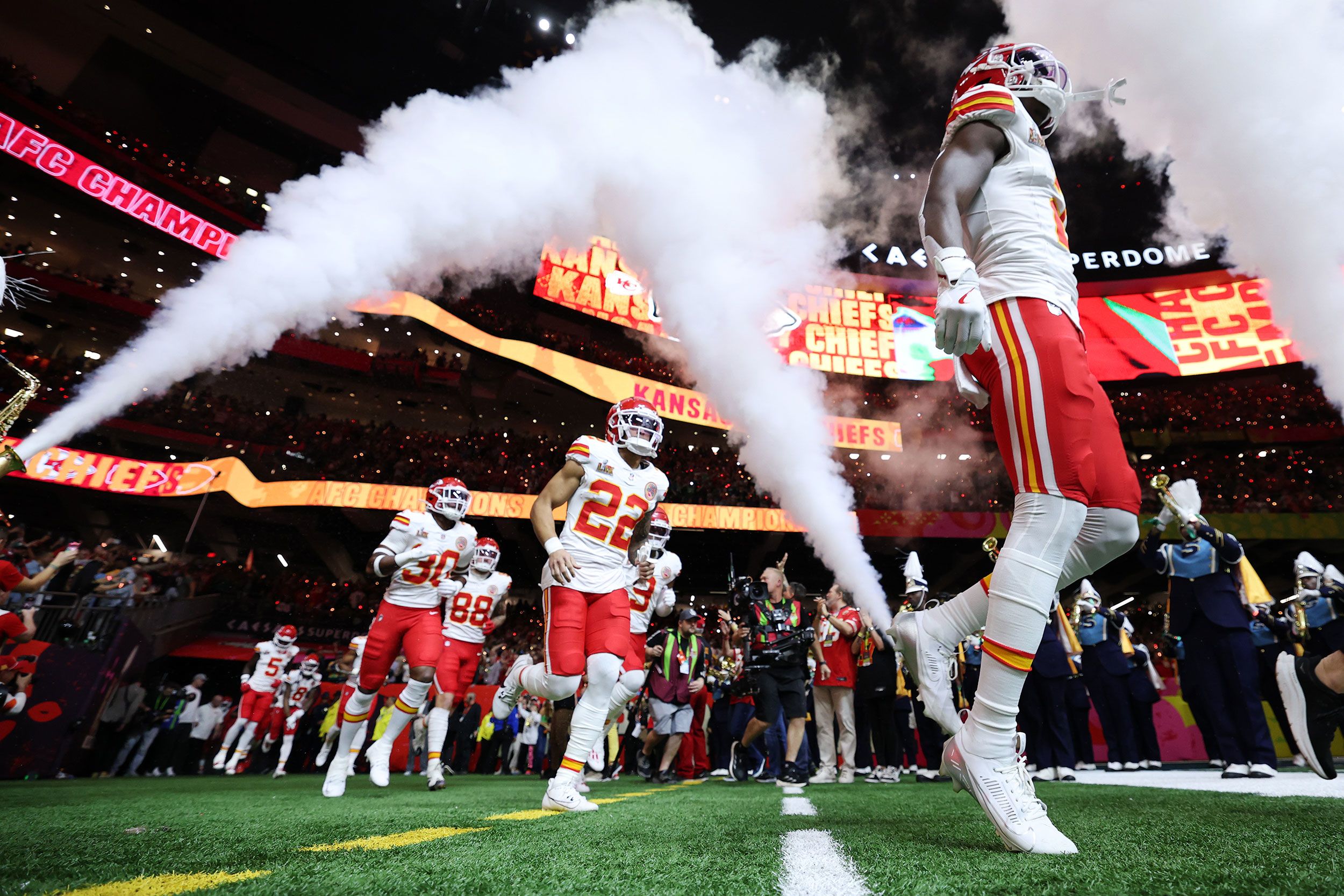 The Chiefs take the field before the game.