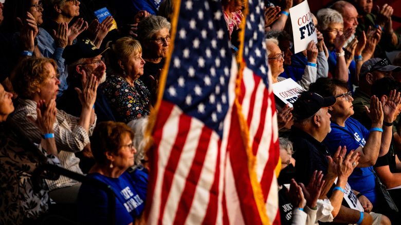 Attendees clap during a Democratic town hall in Lansing, Michigan, on June 6, during the congressional fight over President Donald Trump's landmark spending bill.