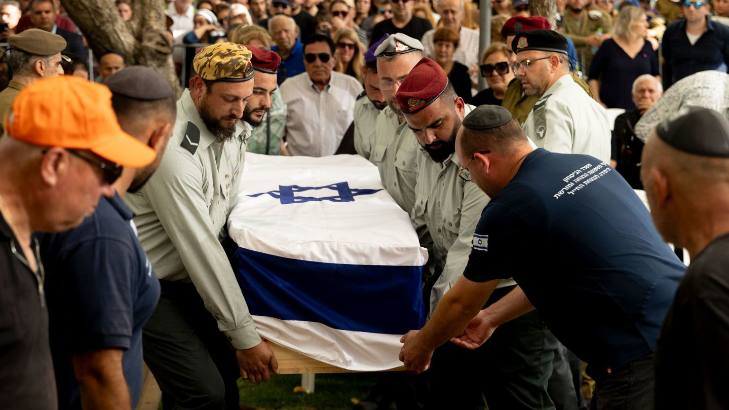 HAIFA, ISRAEL - JULY 8: Israeli soldiers carry a coffin covered with Israeli flag during a funeral for Sgt. First Class Benyamin Asulin on July 8, 2025 in Haifa, Israel. Asulin was one of five Israeli soldiers killed in Beit Hanoun, in the northern Gaza Strip, last night when they were hit by a roadside bomb while patrolling on foot. (Photo by Amir Levy/Getty Images)