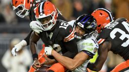 CLEVELAND, OHIO - NOVEMBER 16: Kyle Hamilton #14 of the Baltimore Ravens sacks Shedeur Sanders #12 of the Cleveland Browns during the third quarter at Huntington Bank Field on November 16, 2025 in Cleveland, Ohio. Sanders fumbled the ball on the play. (Photo by Nick Cammett/Getty Images)