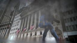 A pedestrian walks near the New York Stock Exchange on Friday.