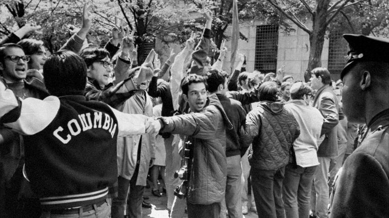 Students form a human chain between demonstrators and police officers at Columbia University on April 30, 1968.