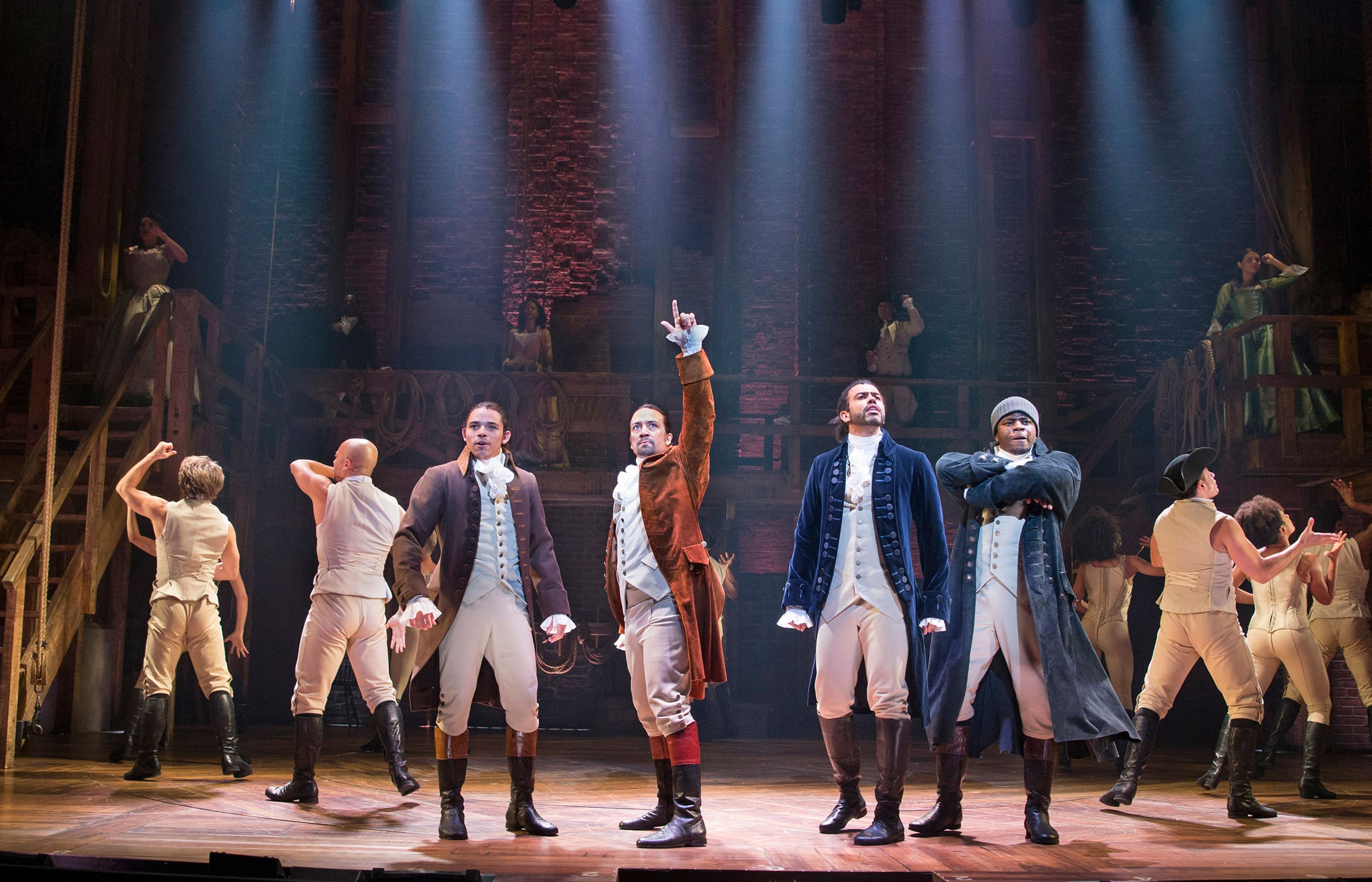 From left, Anthony Ramos, Lin-Manuel Miranda, Daveed Diggs and Okieriete Onaodowan perform in "Hamilton" at the Richard Rodgers Theatre in New York in July 2015.
