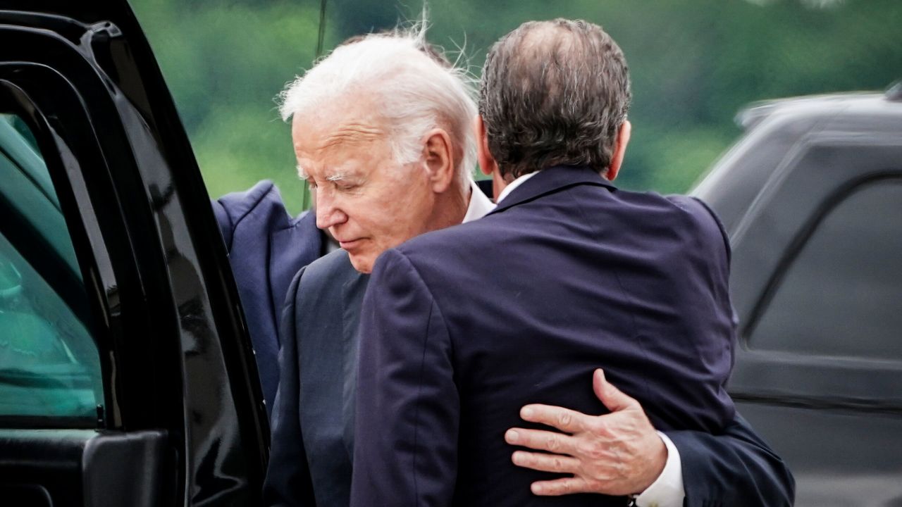 President Joe Biden embraces his son Hunter Biden on the tarmac after arriving in Wilmington, Del., on Tuesday, June 11, 2024. The jury on Tuesday found Hunter Biden, President Biden's long-troubled son, guilty of three felony counts of lying on a federal firearms application in 2018. (Haiyun Jiang/The New York Times)