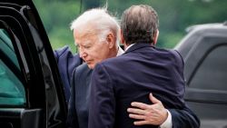 President Joe Biden embraces his son Hunter Biden on the tarmac after arriving in Wilmington, Del., on Tuesday, June 11, 2024. The jury on Tuesday found Hunter Biden, President Biden's long-troubled son, guilty of three felony counts of lying on a federal firearms application in 2018. (Haiyun Jiang/The New York Times)