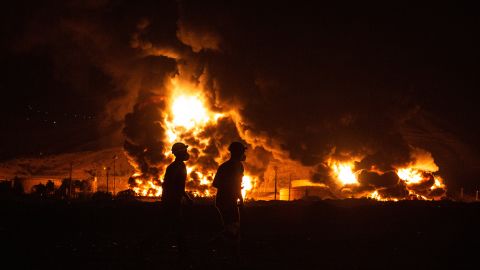 An oil storage facility burns in Tehran, Iran, after being hit by Israeli airstrikes on Sunday, June 15.