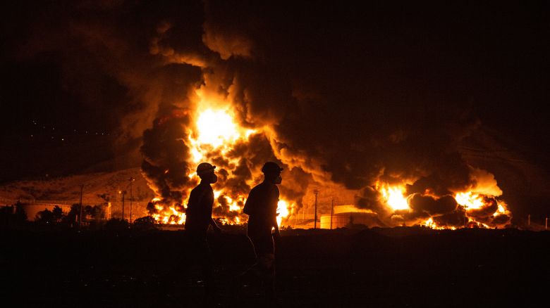 An oil storage facility burns in Tehran, Iran, after being hit by Israeli airstrikes on Sunday, June 15.