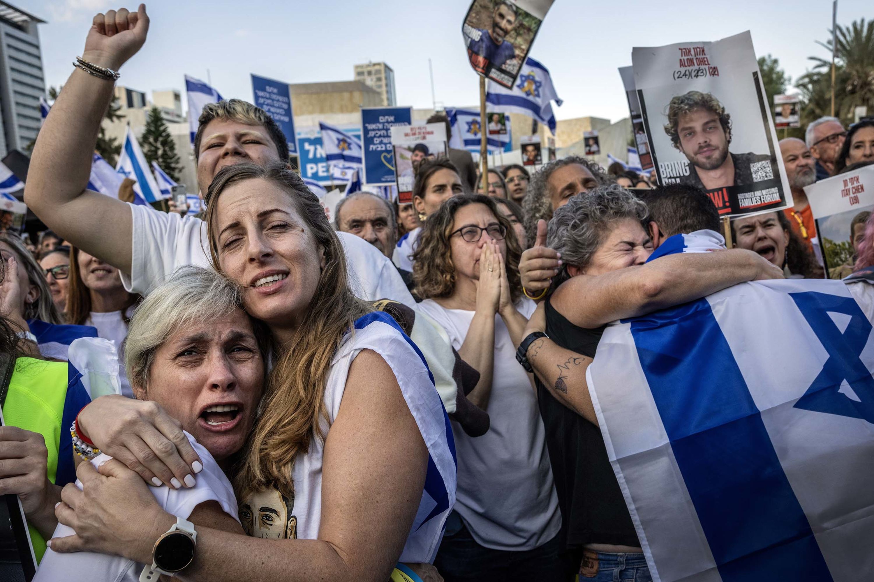People in Tel Aviv, Israel, cheer the release of hostages on Monday, October 13.