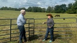 ohn King talks to Iowa voter Shanen Ebersole on her cattle ranch in Kellerton, Iowa.