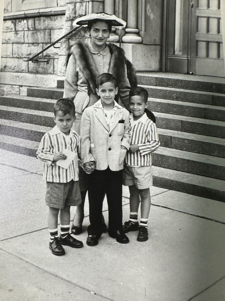 Pope Leo was born Robert Francis Prevost in Chicago on September 14, 1955. He's seen here on the left with his mother, Mildred, and his brothers John and Louis.