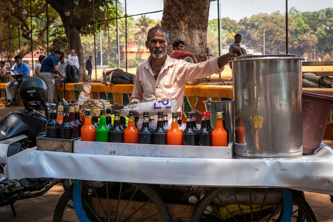 Chanu Gupta, a shaved ice vendor in Mumbai, poses for a picture during an interview with CNN on April 16, 2024.