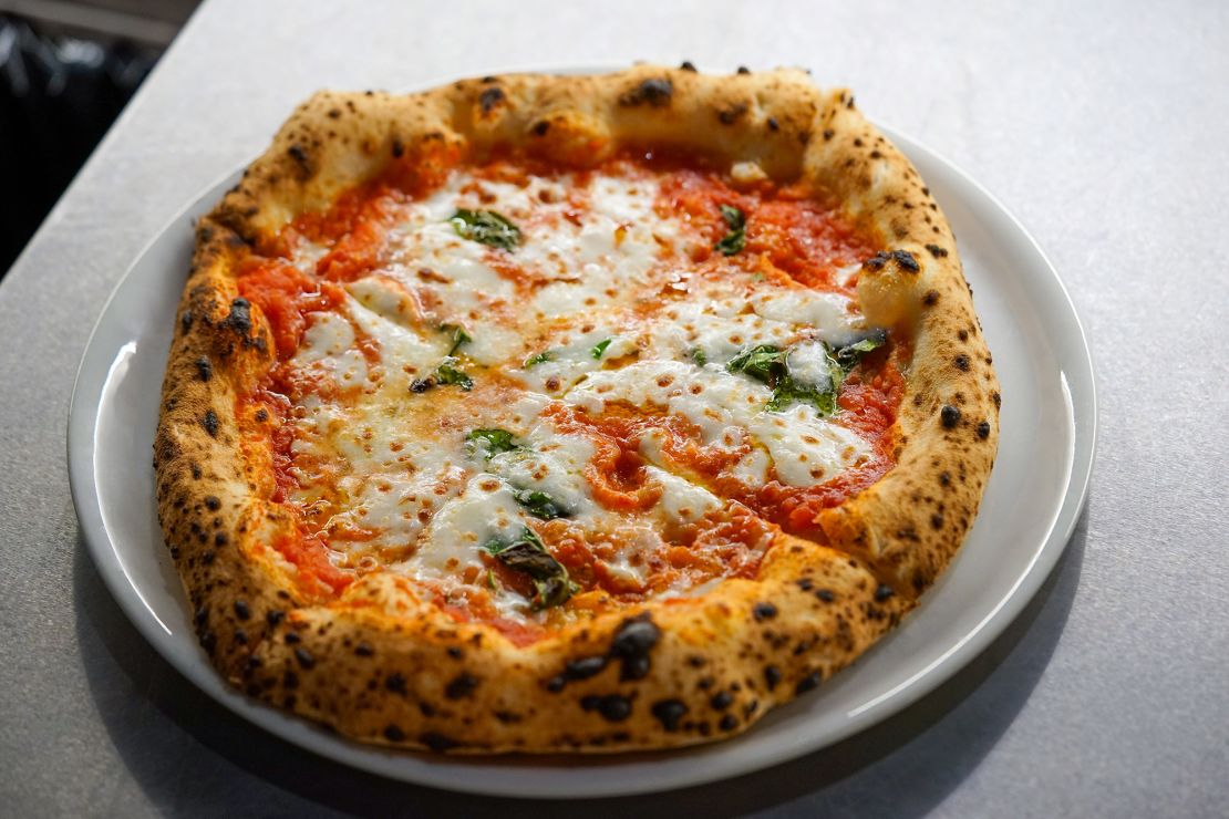 L’Oro di Napoli serves thick and delicious pizzas cooked in a beautiful, blue-tiled pizza oven.
