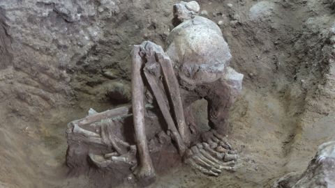 Remains of a middle-aged male excavated from Huiyaotian in Guangxi, China. Researchers found the skeleton in a hyper-flexed position, and dated it to more than 9,000 years ago.