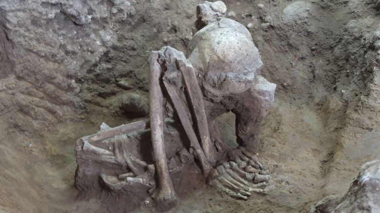 Remains of a middle-aged male excavated from Huiyaotian in Guangxi, China. Researchers found the skeleton in a hyper-flexed position, and dated it to more than 9,000 years ago.