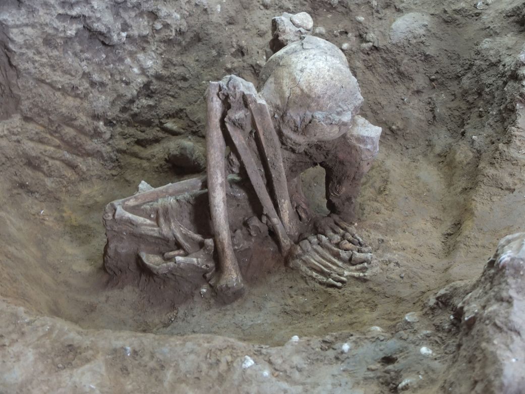 The skeleton of a middle-aged man excavated from the Huiyaotian site in Nanning, in China's Guangxi province, is over 9,000 years old.