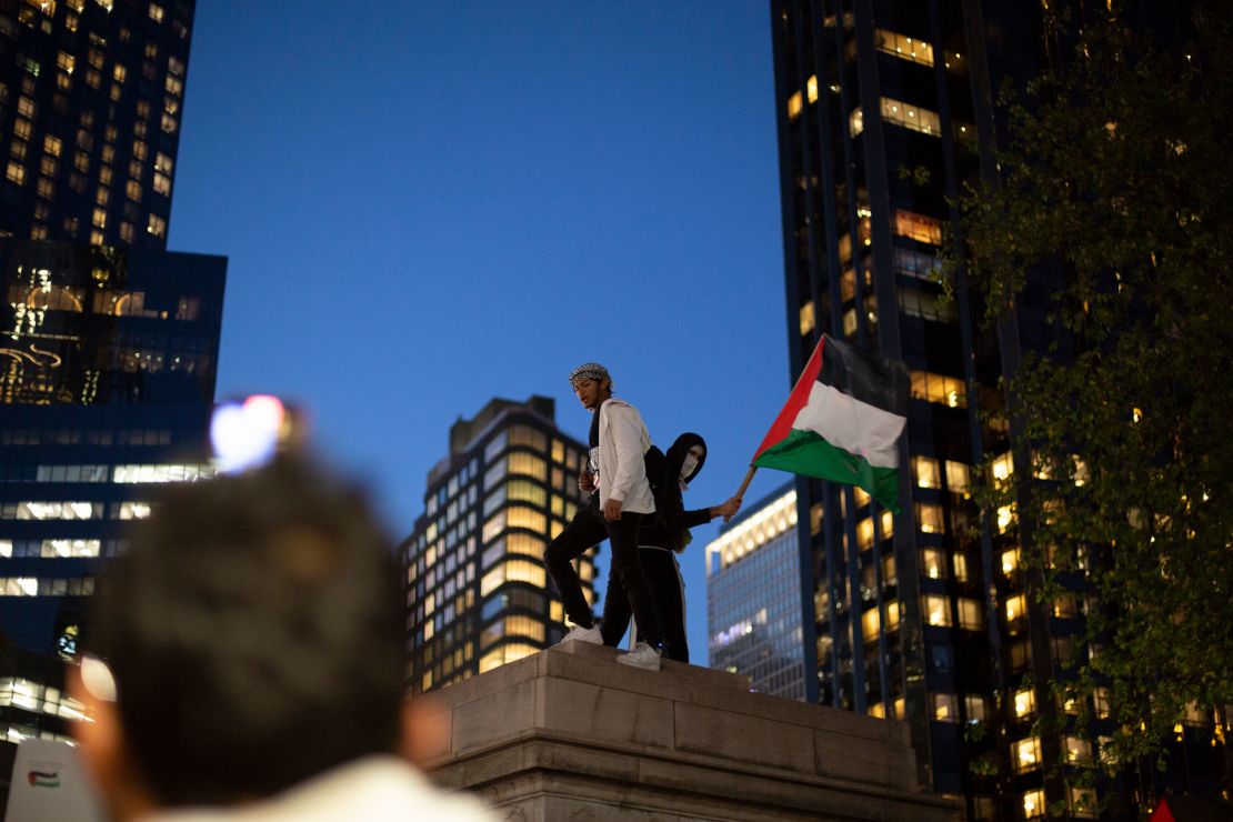 Demonstrators gather in New York's Columbus Circle in support of Palestinians on Friday, November 10.