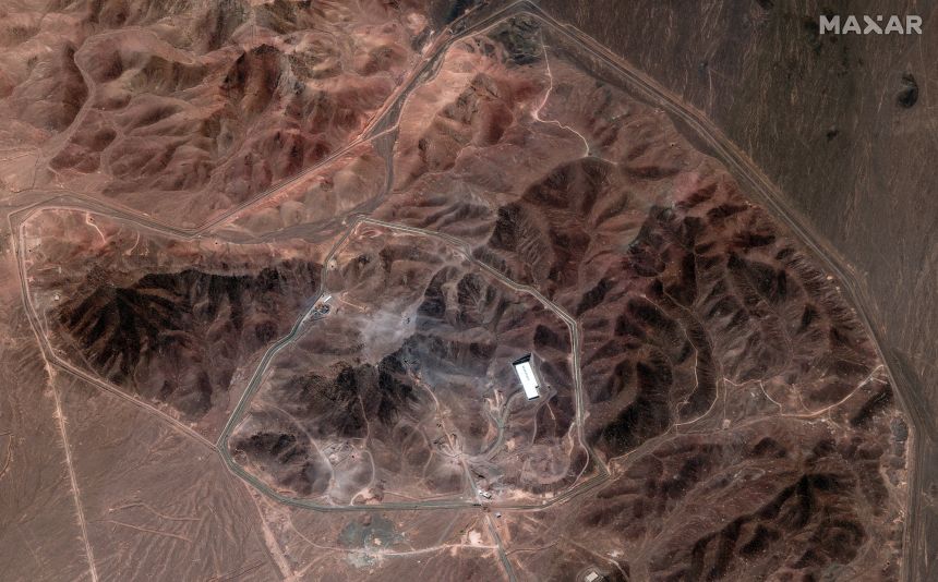 Satellite images shared by Maxar Technologies in June show vehicles, drilling equipment and cranes at Iran's Fordow nuclear facility, which was targeted by the US.