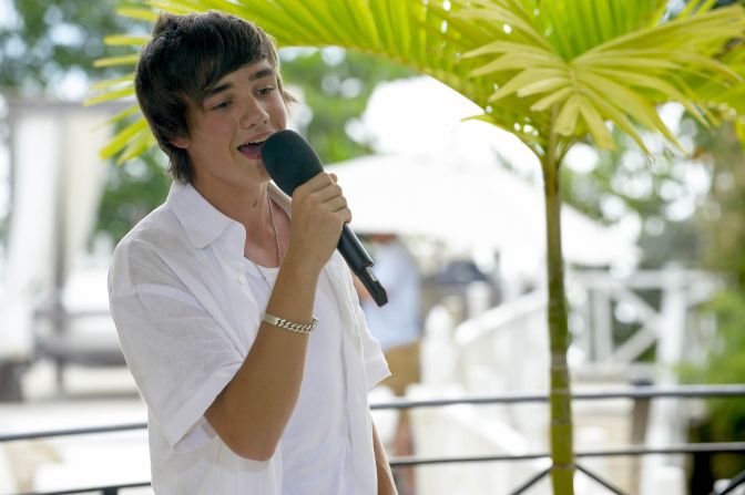 Payne performs on the British version of "The X Factor" in Barbados in 2008. He was cut from the competition but returned two years later to audition again.