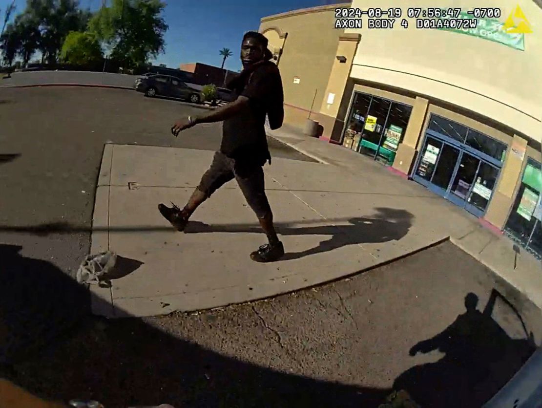 Tyron McAlpin is seen on body camera footage as a police officer approaches him.