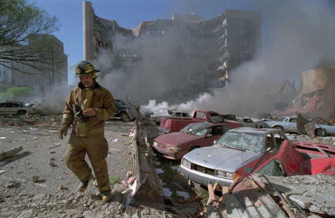 A firefighter works at the scene of the Oklahoma City bombing on April 19, 1995.