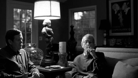 Peter Leonard listens in his family room while his father, Elmore, smokes and talks about writing.